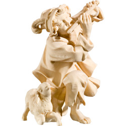 Pastor arrodillado con flauta y cordero